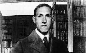 HP Lovecraft, doing what he does best; staring at nothing while surrounded by books. 